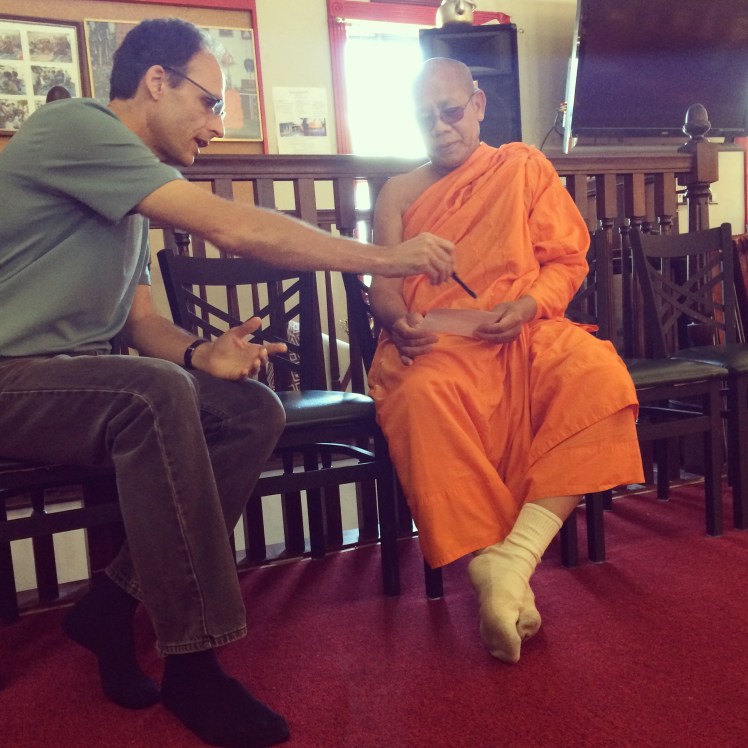 Steve P (Troy's mentor/coach) shares the gospel w head monk of local Lao Buddhist temple in Nashville.